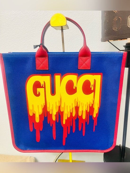 Gucci Handbags - NWT Gucci Children's Melting Logo Tote Bag w/Dust bag